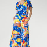 The Dany Culotte in Summer Bliss is crafted from cool-touch slinky jersey and printed with a bold abstract design. With a wide-leg shape for movement and a soft pull-on waistband for comfort, it’s the perfect mix of style and ease. Complete with side pockets, this culotte is ideal for work, travel, and weekend wear.