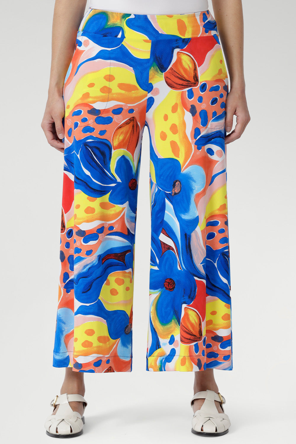 In our signature cool-touch slinky jersey, the Dany Culotte in Summer Bliss brings refined ease to every occasion. A bold abstract print dances across a clean white backdrop, while the wide-leg silhouette creates a graceful flow. Thoughtfully designed with a soft, supportive waistband and functional pockets, this style transitions seamlessly from desk to dinner.