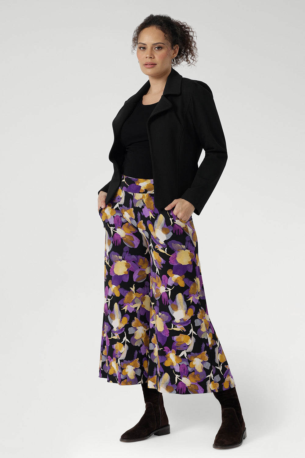 The extra-wide leg creates a flowing silhouette, while the cropped length and deep hemlines add modern flair. Designed with a double-layer pull-on waistband and functional side pockets with chic visible stitching, the Dany Culotte blends fashion and function seamlessly.