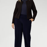 Designed with a sleek, collarless silhouette, the Drake Jacket features a round neckline and an open-front design for easy layering. Double-layered front panels provide a tailored, refined look, while the single-layer back with shaping darts ensures a flattering fit.