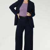 Women's workwear pants in Navy feature wide leg pant pant that feature a high waist, tailored belt loops and straight leg. Stylish and corporate workwear for women size 8 - 24. Made in Australia.