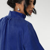 Workwear shirt features a collared V-neckline, cuffed sleeves and shirttail hemline that sits longer at the back. Woman's workwear clothing proudly made in Australia in sizes 8-24.