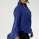 The Ellis Shirt in Cobalt has an oversized fit, designed to be worn loose or front-tucked. Ellis is a pull-on style shirt featuring a collared V-neckline, cuffed sleeves and shirttail hemline that sits longer at the back. Crafted from suede touch Tencel fabric that has a luxurious feel and drape. Proudly made in Australia in sizes 8-24.