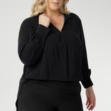 Australian made woven shirt in soft and breathable graphite tencel fabric. With cuff detail and collared neckline, that can be styled up along the neck or folded over under jackets. Made in Australia for women sized 8-24.