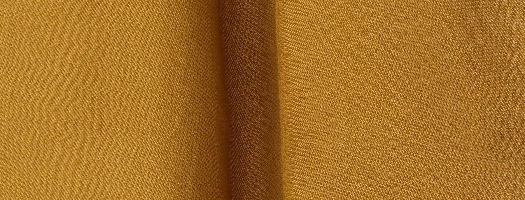 Fabric swatch of Australian and New Zealand women's clothing brand, Leina & Fleur's eco-conscious linen in natural antelope colourway, used to make a range of tailored linen jackets, wide leg pants and shorts for women.