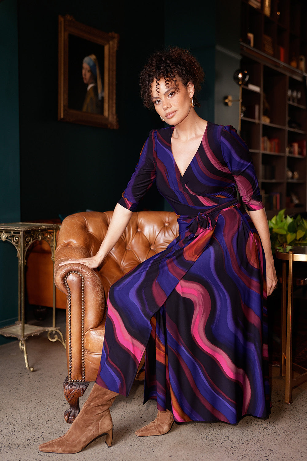 The Fiona Wrap Dress in Jupiter is a vibrant and sophisticated wardrobe essential, showcasing a colourful swirly print that brings energy and movement to every step. Crafted in our luxurious stretch jersey, this classic wrap dress is designed to flatter with a soft A-line skirt that falls gracefully to a midi-length hemline, offering both comfort and timeless elegance.