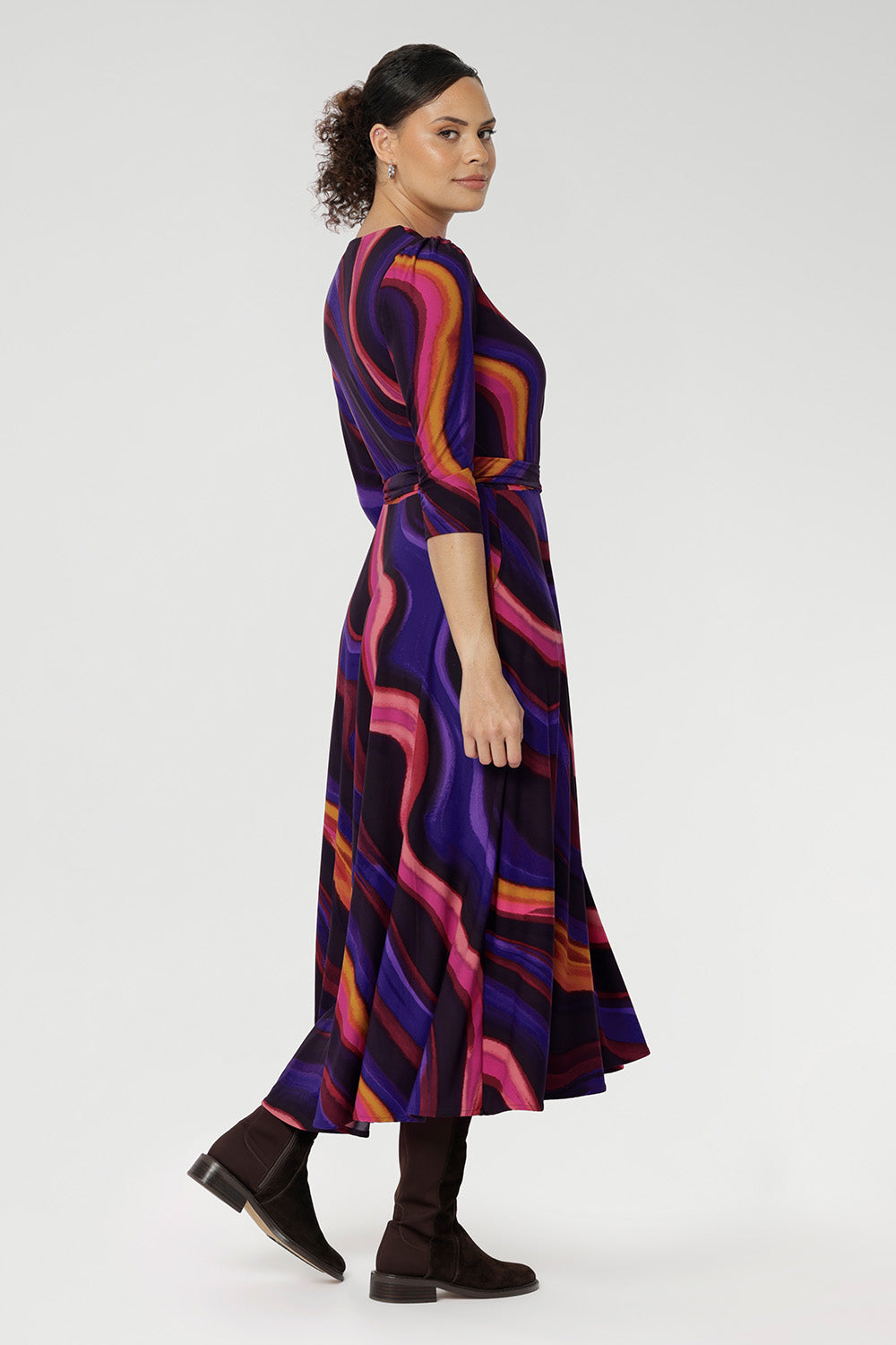 Crafted in our luxurious stretch jersey, this classic wrap dress is designed to flatter with a soft A-line skirt that falls gracefully to a midi-length hemline, offering both comfort and timeless elegance.