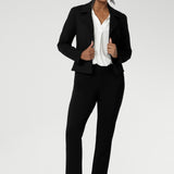 Size 10 woman wears the Garcia Jacket in Black. Tailored design with collar and comfortable stretch. Comfortable and stylish workwear for women. Size inclusive fashion and made in Australia for women size 8 - 24.