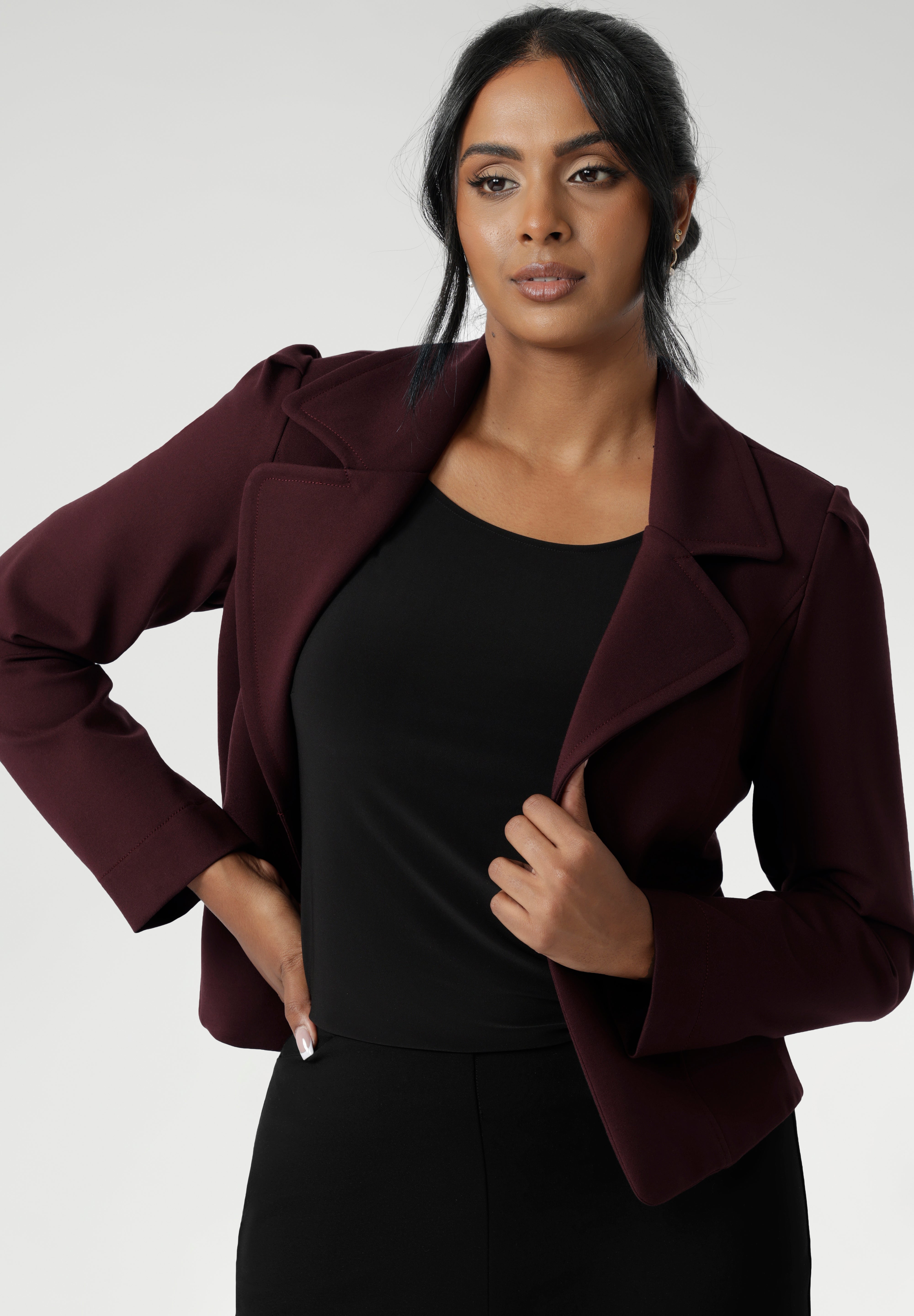 The Garcia Jacket in Burgundy is a modern cropped trench with a tailored, open-front design. Made from firm-stretch fabric, it’s an effortless layering piece for off-duty or workwear looks. Garcia features an open fronted jacket with collar and notch lapels with topstitch details. Double layer jacket is tailored with front panels and back darts. Proudly made in Australia in sizes 8-24.