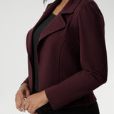 Garcia features an open fronted jacket with collar and notch lapels with topstitch details. Double layer jacket is tailored with front panels and back darts. Proudly made in Australia in sizes 8-24. Size 10 woman wears her jacket with black black workwear pants.
