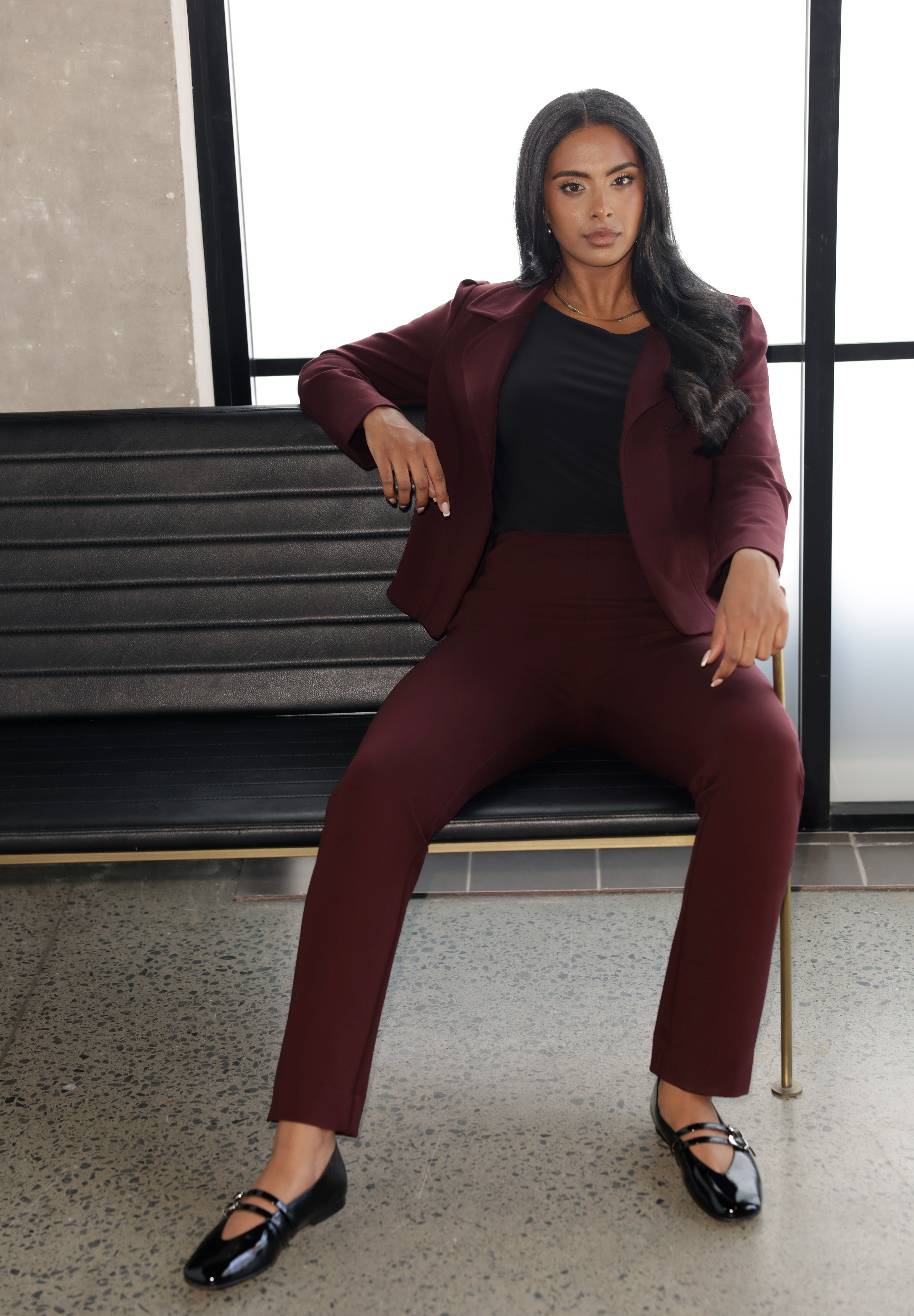 Size 10 woman wears a pull-on style pant, crafted from dry touch Ponte fabric that provides firm stretch and full body comfort. Over 30's model wears the Garcia Jacket in the matching burgundy colour for a coordinated suiting look. Available in sizes 8-24.