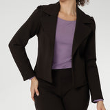 The Garcia Jacket is a modern interpretation of the classic trench, reimagined in a chic cropped silhouette. Expertly crafted from premium dry-touch Ponte jersey fabric with firm stretch, this tailored open-front jacket offers structure, comfort, and ease of movement