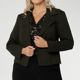 The Garcia Jacket in Olive is a contemporary take on the classic trench, reimagined in a rich, earthy tone that adds depth and versatility to your wardrobe. Crafted from premium dry-touch Ponte jersey fabric with firm stretch, this tailored, open-front jacket delivers both structure and comfort, making it an ideal layering piece for work, weekends, or travel.