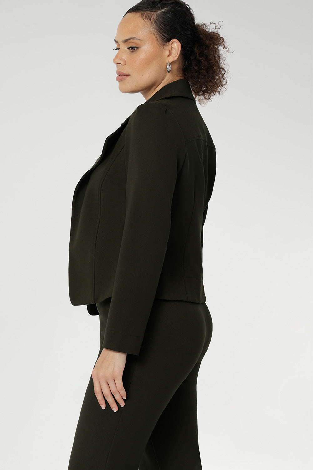 The olive hue brings a grounded yet polished aesthetic that pairs beautifully with both neutrals and bold tones, and it coordinates effortlessly with the matching Paxton Pant for a streamlined, modern look. Proudly designed and made in Australia, the Garcia Jacket in Olive is the perfect balance of timeless tailoring and everyday ease.