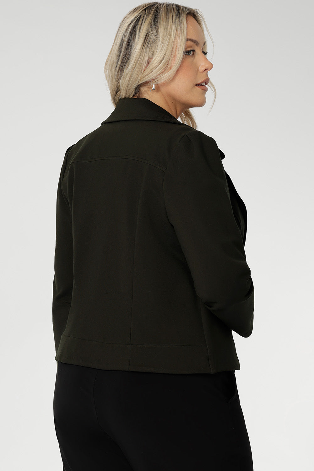 The olive hue brings a grounded yet polished aesthetic that pairs beautifully with both neutrals and bold tones, and it coordinates effortlessly with the matching Paxton Pant for a streamlined, modern look. Proudly designed and made in Australia.