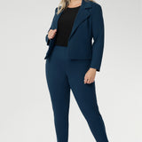 Made from firm-stretch fabric, it’s an effortless layering piece for off-duty or workwear looks. Plus size woman wears the Garcia Jacket in Petrol, for a modern cropped trench with a tailored, open-front design. Available in sizes 8-24.