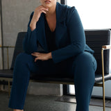Model wears the Garcia Jacket in Petrol ponte fabric by Australian and New Zealand women's clothing brand, L&F. Featuring collar and notch lapels and long sleeves, this open-fronted jacket is good for corporate wear and casual wear.
