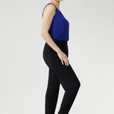 Designed for comfort on the move, the Indi Pant is made from lightweight dry-touch stretch jersey for a soft, flexible fit. Featuring a pull-on waistband, relaxed crotch, and tapered 7/8 leg with tuck detail, these pants are perfect for travel, weekends, or casual workdays. Available in two heights, ideal for modern women on the go.