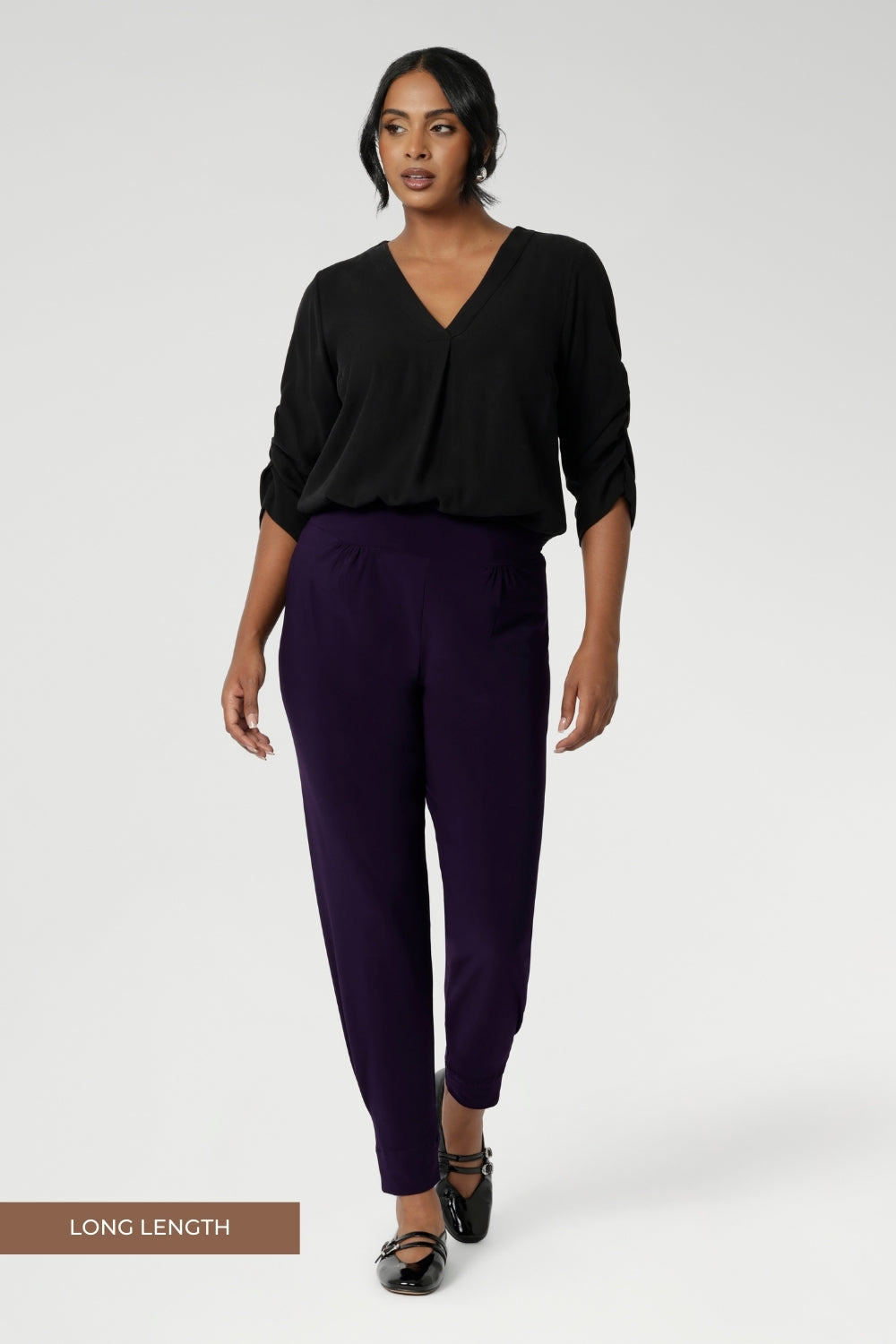 A size 10 Indi pant in Amethyst in a jersey workwear pant with pleat front and cuffed leg opening. Made in Australia for women size 8-24. Styled back with the Terry Shirt in Graphite. Now available in 2 lengths.