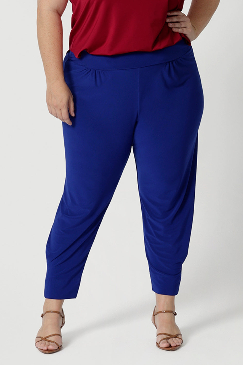 Close up image Indi Pants made by Australian fashion label Leina & Fleur. These easy care pants are made in many different colours and prints from high-quality dry-touch jersey, the fabric feels smooth and soft against the skin while offering the added benefits of stretch and breathability. Whether you're moving through your workday or running errands, these pants provide all-day comfort with a flattering fit that moves with you.