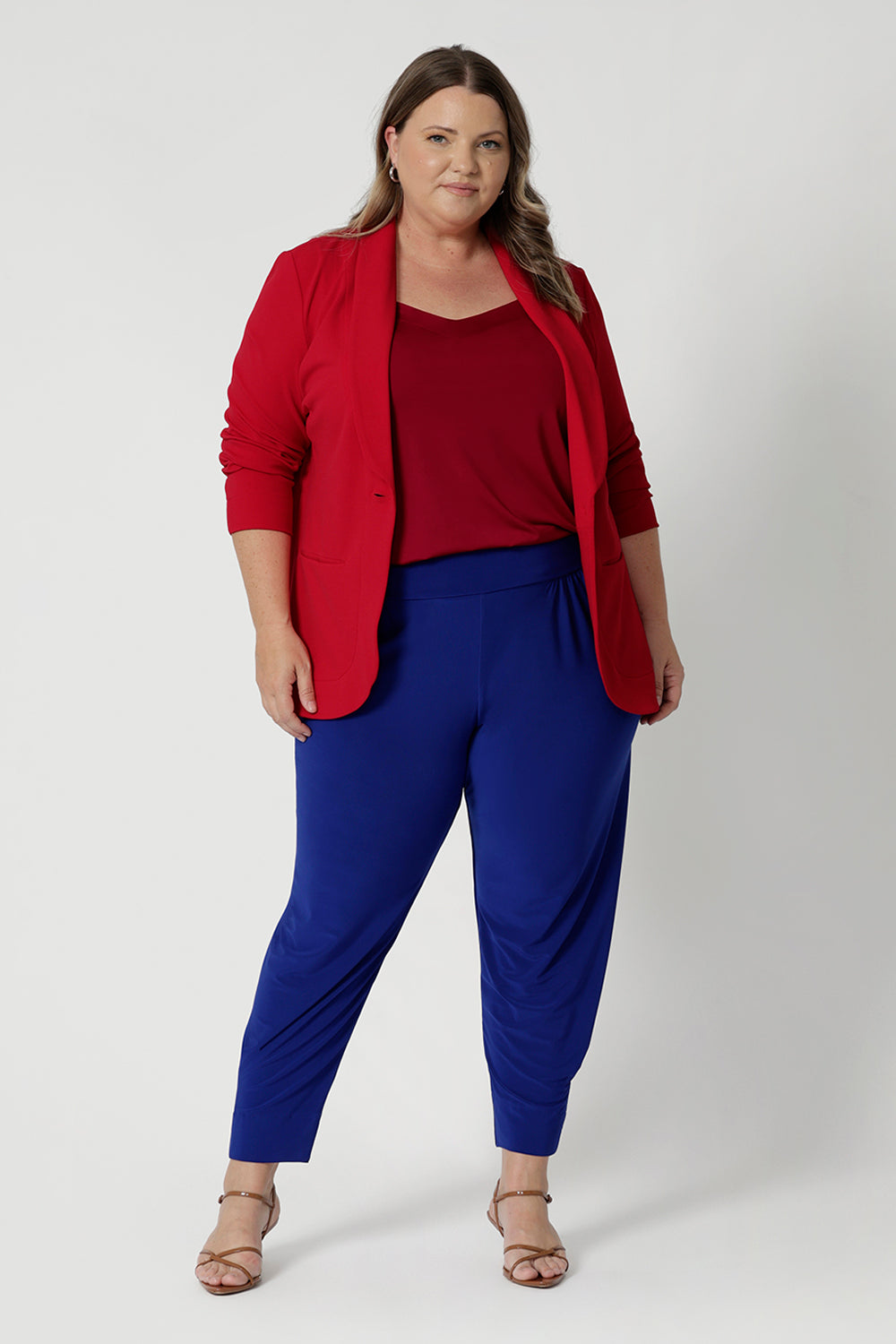These pants are perfect for both business casual and smart casual environments, whether worn with a blazer and blouse for a professional look or paired with a simple top for a more relaxed outfit. Their versatility, vibrant colour, and high-quality, easy-care fabric make them a standout piece in any wardrobe.