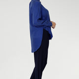 Indi is the perfect travel pant that feels so comfortable to wear, that you'll end up getting more than one pair. Can be styled with Tencel tops for elevated workwear style. Available in two different heights. These stylish 7/8 length pants feature single inside seam legs, a tapered leg fit, and ankle cuffs with a tuck detail for a sleek, modern look.