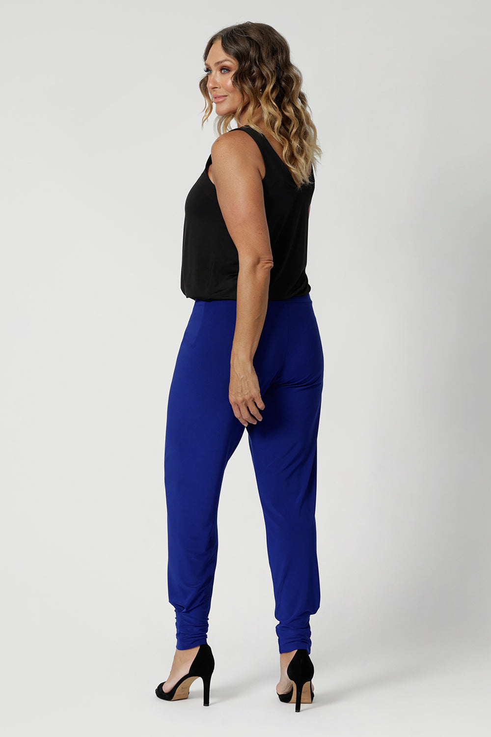 Available in many brightly coloured shades as well as classic coloures. These comfortable pants feature vibrant pop to your travel wardrobe, making them an eye-catching and stylish option for any occasion. These easy care pants are made from dry touch jersey fabric, effortlessly creating the travel pant of your dreams. Available online at Leina & Fleur in sizes 8-24