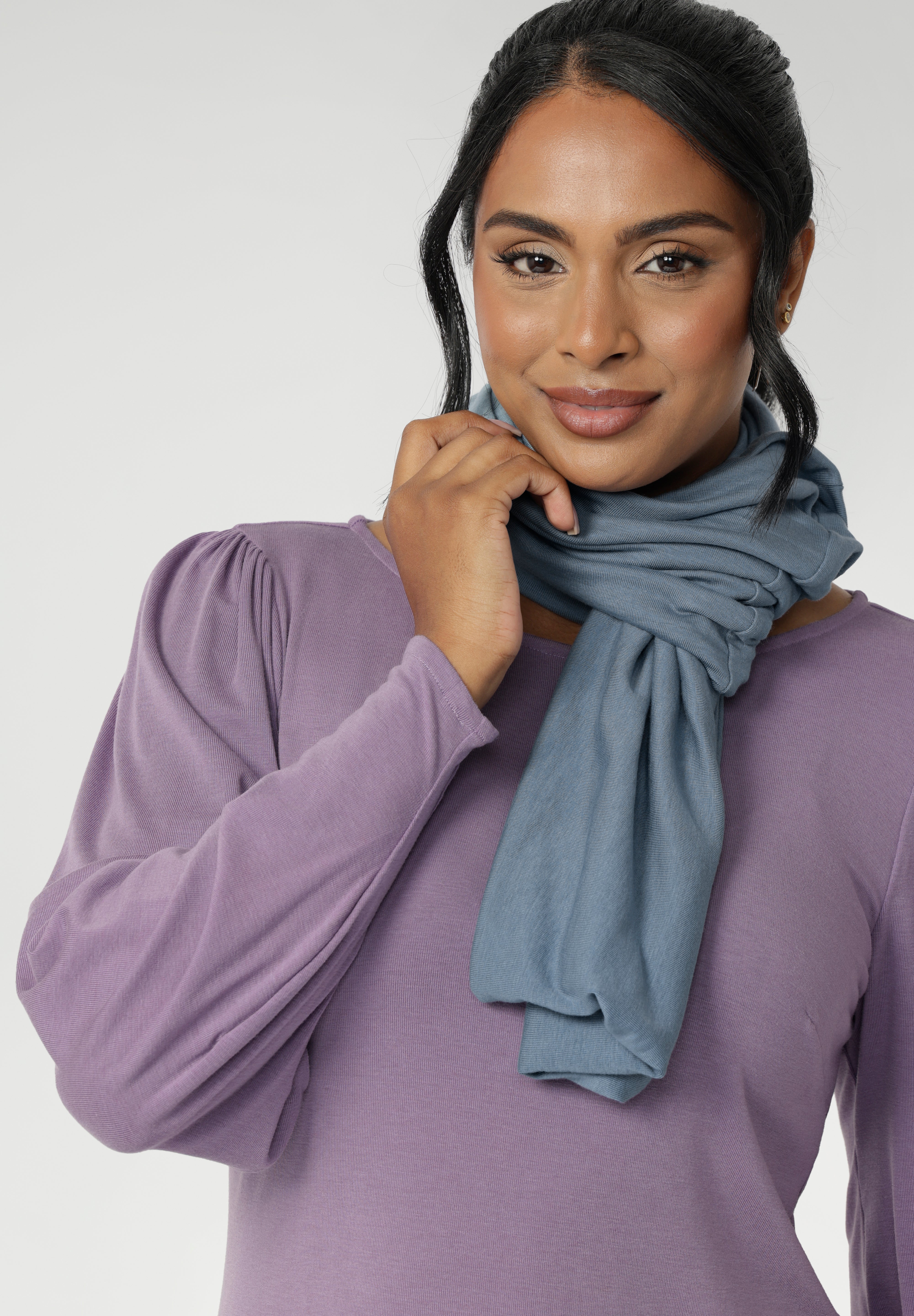 Crafted from a soft Tencel wool blend, each scarf features a luxe double-layer construction in a closed-loop design that drapes beautifully, whether worn long and relaxed or styled with a cozy double wrap around the neck. Longe scarf can be easily styled in countless ways for endless styling.