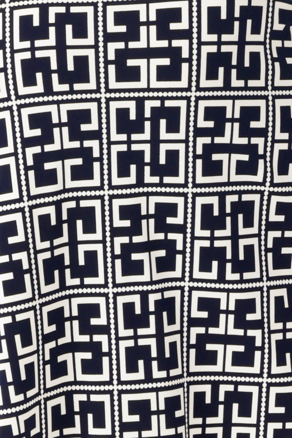 The Ink Olympia print. A sophisticated navy and white geometric design, features across a curated collection of women’s tops, pants, and dresses by Australian fashion brand Leina + Fleur. Proudly made in Australia and available in sizes 8 to 24, this elegant print offers endless styling versatility, easily paired with a range of colours or matched together for a coordinated, head-to-toe look.