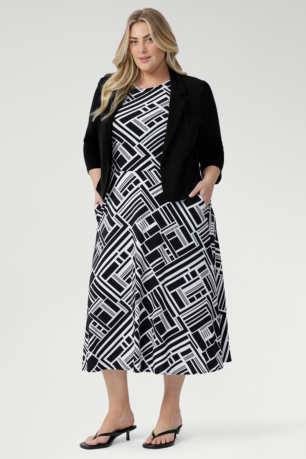 Proudly designed and made in Australia, the Janine Dress is a wardrobe essential for women who value quality craftsmanship, flattering cuts, and effortlessly chic design. Available in sizes 8-24.