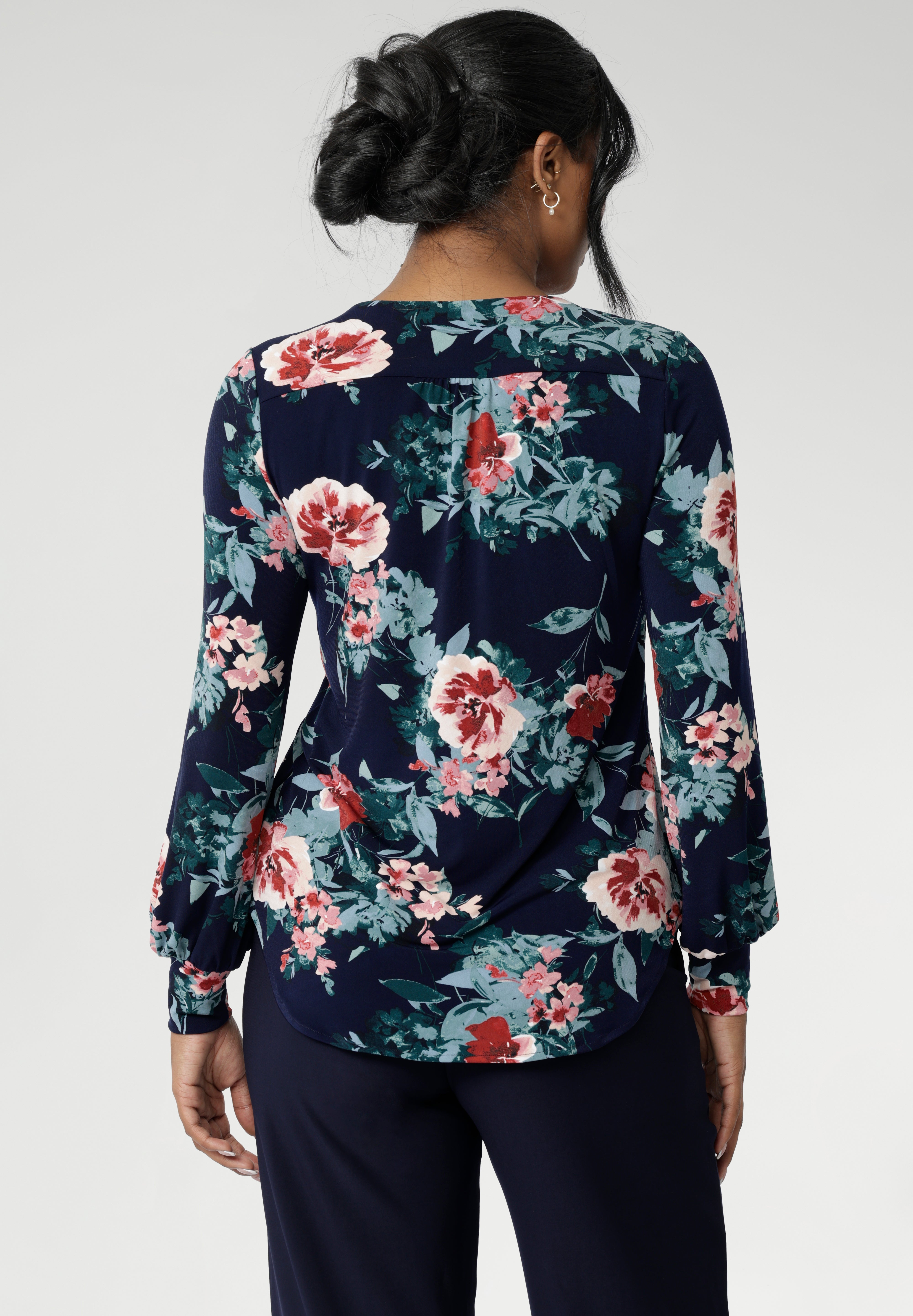 This semi-fitted silhouette features a soft scoop neckline with clean facing detail, bust darts for subtle shaping, and full-length bishop sleeves finished with a cuff that can be styled to suit your look. A classic shoulder yoke with gentle gathers at the centre back adds to the top’s fluid drape, while the shirttail hemline offers a flattering finish that looks beautiful tucked or worn loose.