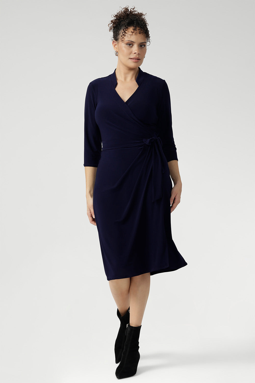 Designed with signature dry-touch stretch jersey fabric, the Jett Dress is a wrap dress with midi length skirt. Available in Sizes 8-24 and Proudly Made in Australia.