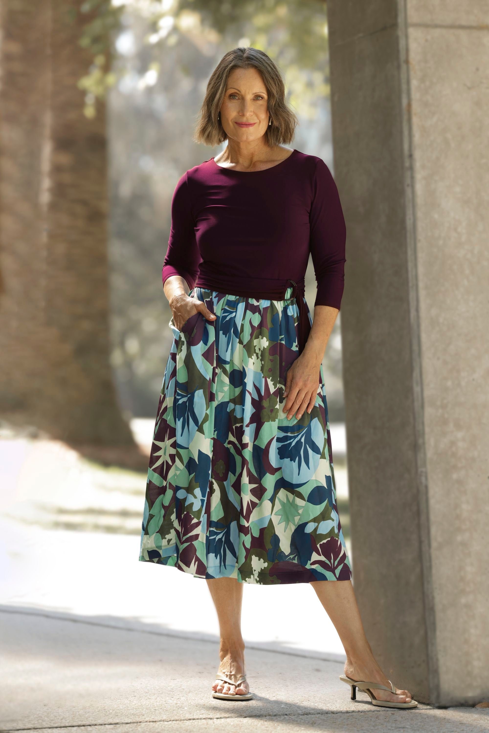 Effortlessly stylish and endlessly wearable, the Joanie Dress in Scandi Abstract is your go-to piece for comfort, confidence, and flair. Blending a soft, dry-touch stretch jersey bodice in rich plum with a flowing Italian Viscose skirt, this dress delivers the perfect balance of structure and movement.