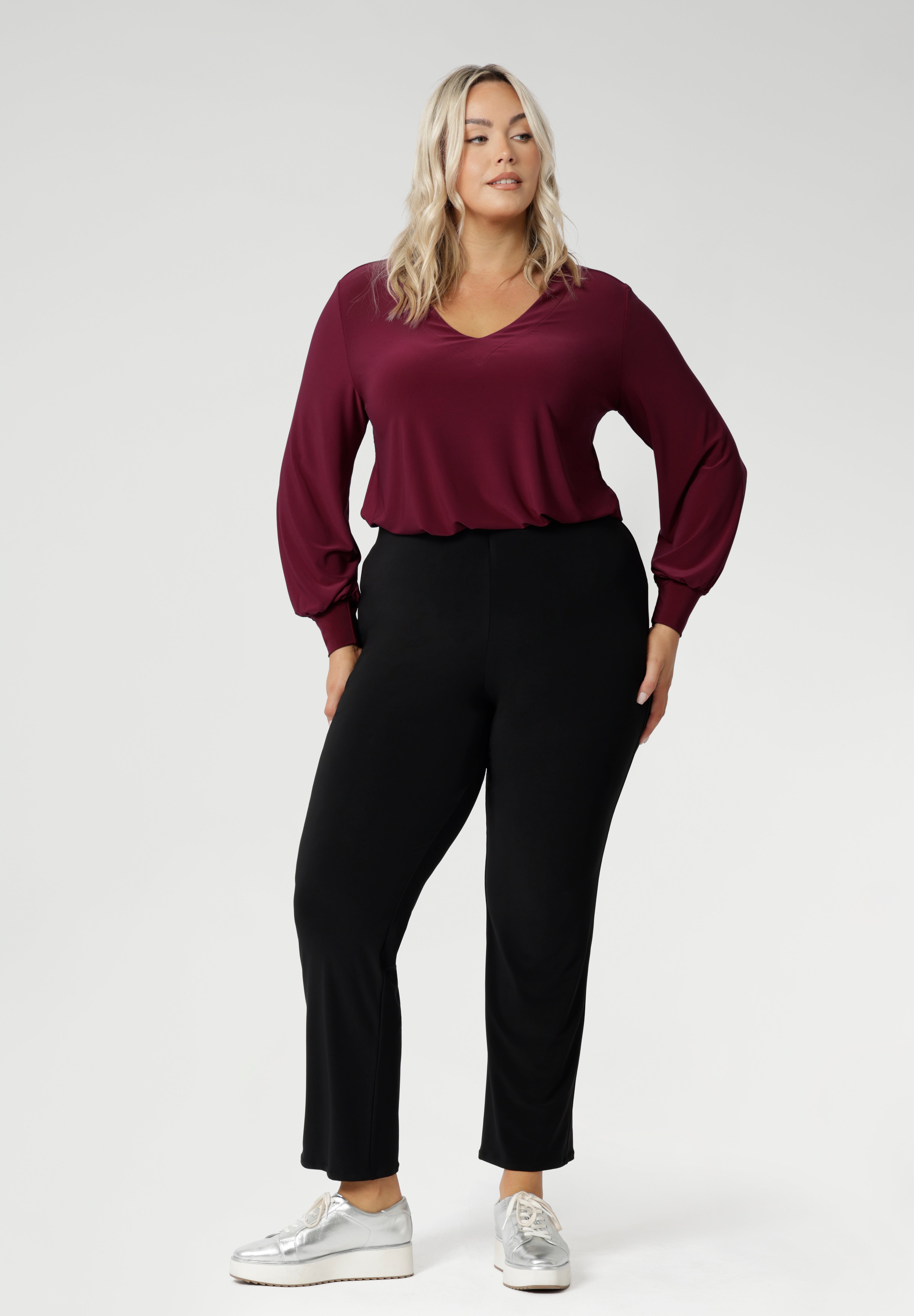 The pull-on style features internal elastic at the waist for added comfort, while darts at the back provide shaping for a flattering silhouette. With a straight-cut design and full-length fit, the Joel Pant offers a sleek and modern look. Additionally, this versatile pant comes without pockets for a clean, streamlined appearance.