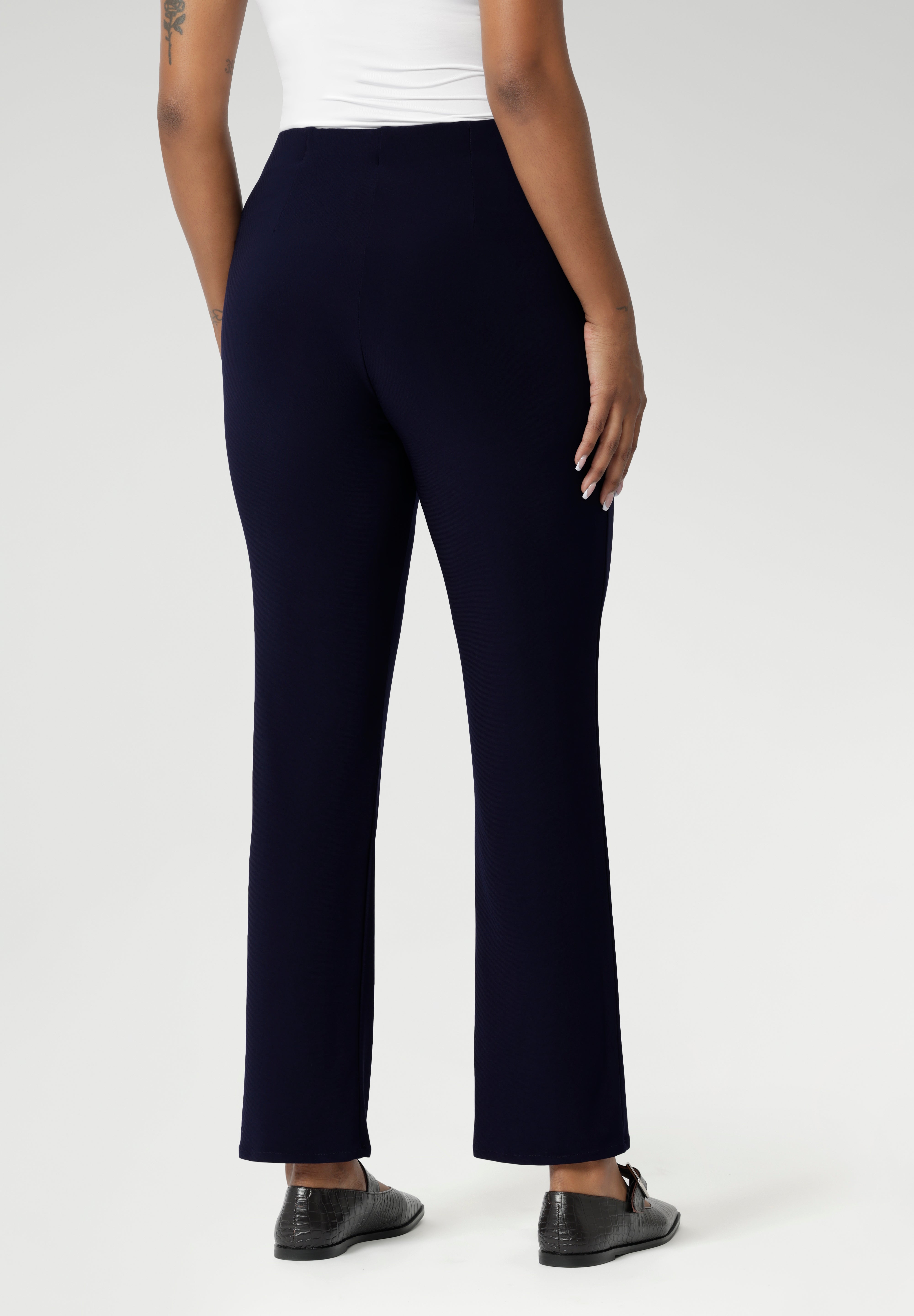 The pull-on style features internal elastic at the waist for added comfort, while darts at the back provide shaping for a flattering silhouette. With a straight-cut design and full-length fit, the Joel Pant offers a sleek and modern look. Additionally, this versatile pant comes without pockets for a clean, streamlined appearance.