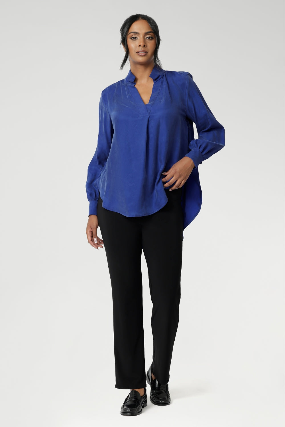 These classic black straight-leg pants are a timeless wardrobe essential, offering both style and comfort for a range of occasions. Made from soft-touch black jersey fabric, they provide a smooth, luxurious feel against the skin while offering breathability and flexibility for all-day wear.