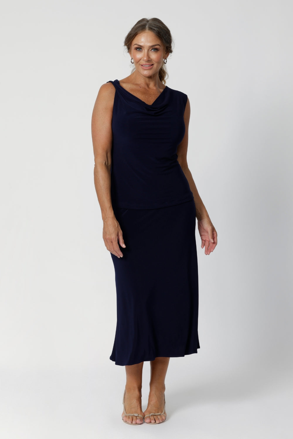 The straight hem offers excellent styling versatility—tuck it in for a polished, professional look or leave it out for a more relaxed, easygoing style faux jumpsuit look.