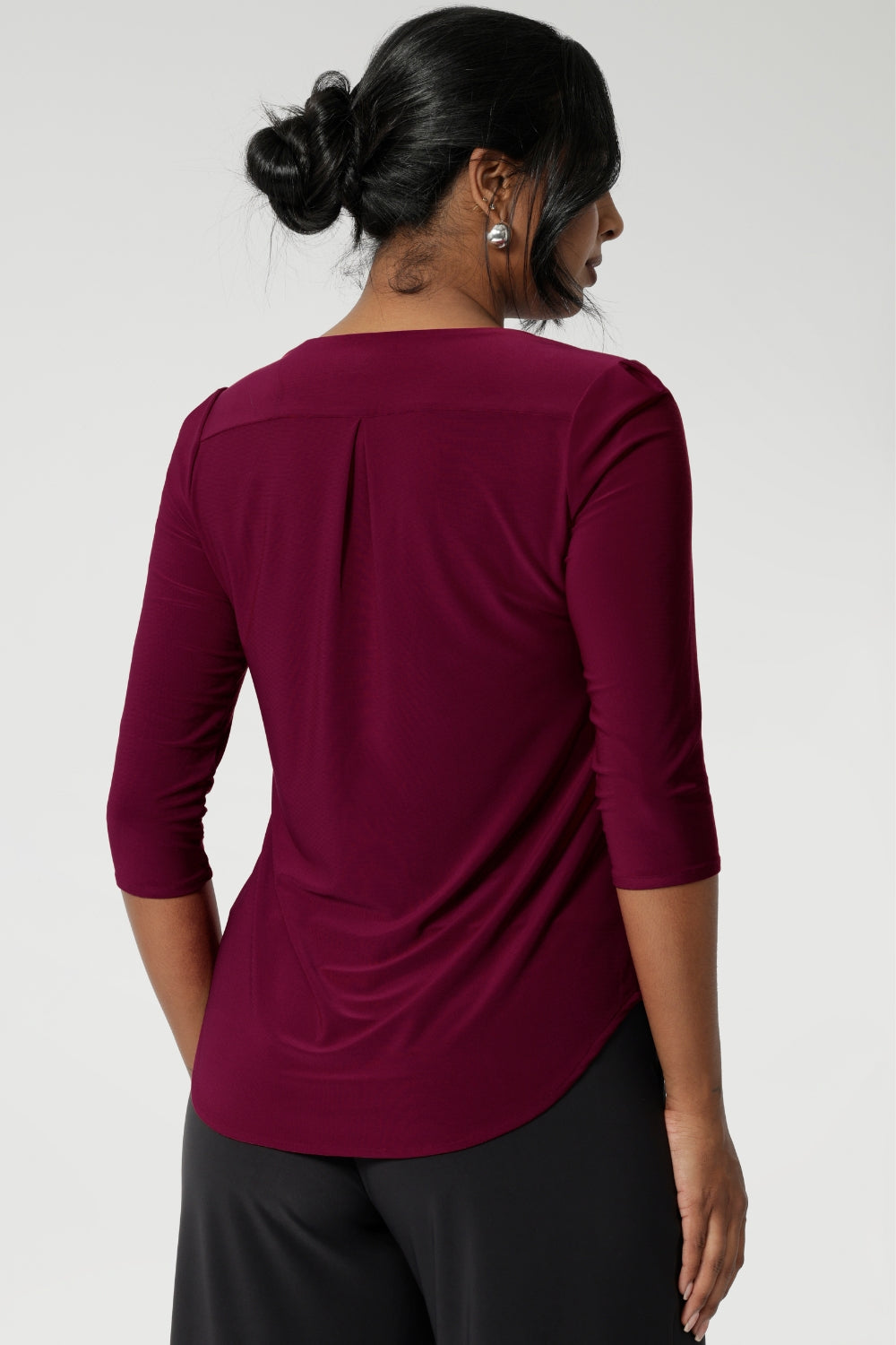 Made in Australia from easy-care fabric, this top is designed for the working women of Australia and New Zealand, offering both convenience and style.