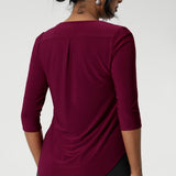 Made in Australia from easy-care fabric, this top is designed for the working women of Australia and New Zealand, offering both convenience and style.