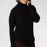 Introducing the Kean High Turtleneck Top from our Light Layers collection—a stylish and functional wardrobe essential designed to keep you comfortable as the seasons change.
