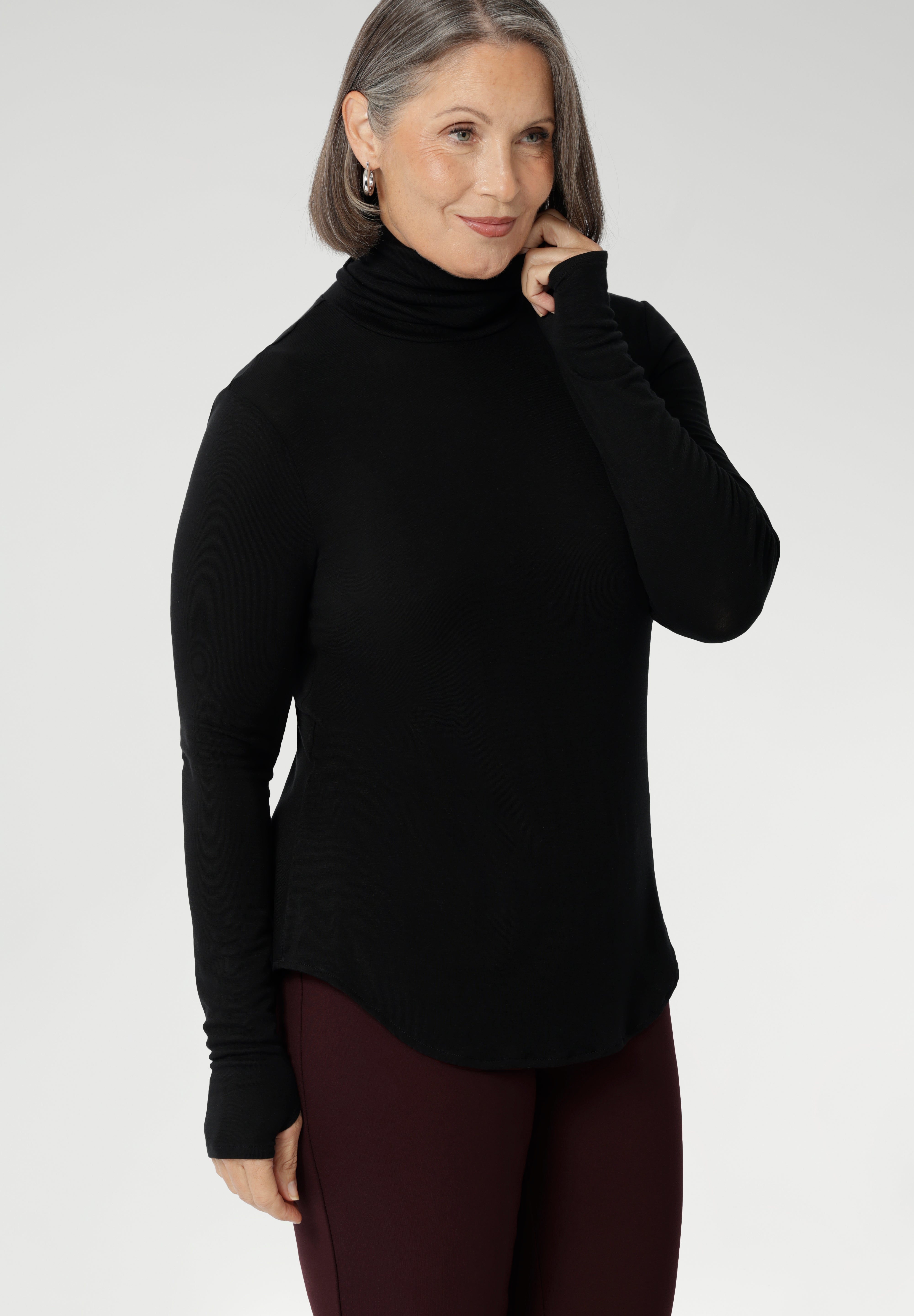Introducing the Kean High Turtleneck Top from our Light Layers collection—a stylish and functional wardrobe essential designed to keep you comfortable as the seasons change.