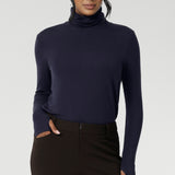 Introducing the Kean high turtleneck top from the Light Layers collection, a stylish and functional piece designed to elevate your wardrobe as the seasons cool.