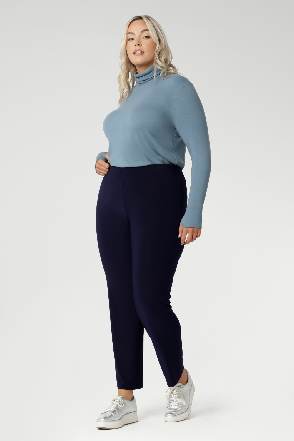 Made from a blend of stretchy Tencel wool fabric, it offers both flexibility and coziness, making it the perfect layering piece for cooler weather. Available in sizes 8-24 and proudly made in Australia, the Kean top is a must-have addition for anyone seeking versatility and style during the colder months.