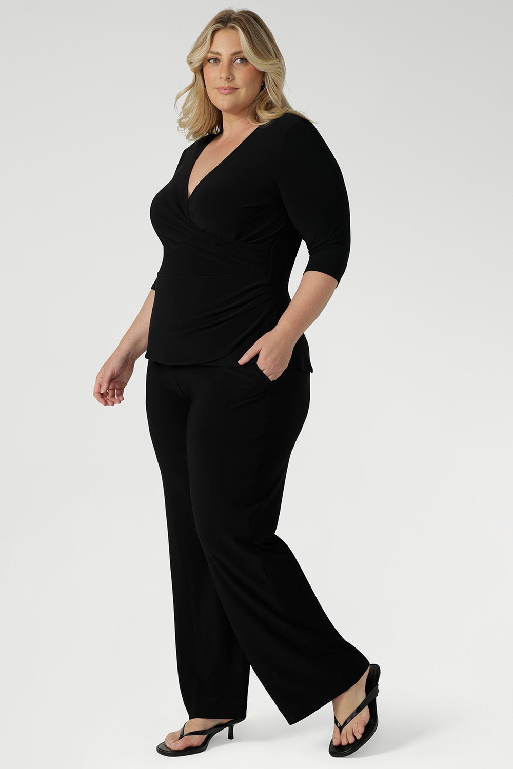 The Kyle Top is a versatile, timeless piece that transitions seamlessly from desk to dinner. It's the ideal combination of professional polish and all-day comfort, a must-have for any modern wardrobe. Available in sizes 8-24.