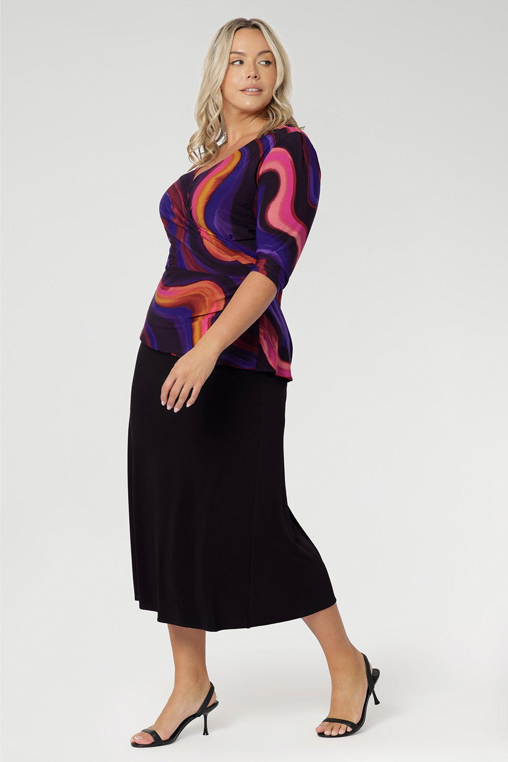 Proudly designed and made in Australia. Available in inclusive sizes 8–24. Wear it loose for a graceful drape or tuck it into high-waisted pants for a more defined, office-ready look.