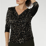 Three-quarter sleeves provide comfortable coverage, making it ideal for year-round wear, and the shoulder yoke with a tailored back tuck enhances the fit and adds refined structure. Finished with a curved shirttail hemline, the Kyrie Top can be styled tucked in for a polished look or worn loose for effortless sophistication.