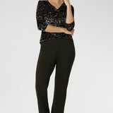 Crafted from premium dry-touch Ponte jersey fabric with firm stretch, these pull-on pants deliver a flattering fit that moves with you. The sleek bootcut silhouette elongates the legs, making it perfect for both professional and casual styling.