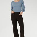 Designed for versatility, it features a classic bootcut leg that enhances and elongates your silhouette, making it ideal for both office wear and everyday styling. Discreet side pockets with refined topstitch detailing add a functional yet polished finish.