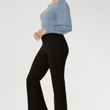Elevate your wardrobe with the Lesley Bootcut Pant in Cocoa, a rich, earthy tone that brings warmth and sophistication to any outfit. Crafted from premium dry-touch Ponte jersey fabric with firm stretch, this sleek pull-on pant is designed to offer structure, comfort, and style all day long.