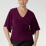 Crafted from our signature dry-touch stretch jersey, the Luna Top is designed with professional style and all-day comfort in mind, featuring handkerchief sleeves, and a stylish V-neckline that adds sophistication.
